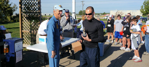 Miguel Espinosa accepting the Men's First Prize